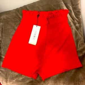 High waisted lined size 2 slim fit dressy red short.
